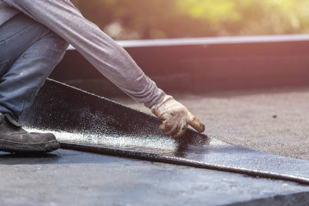 Professional Waterproofing technician working in Lake Orion, MI